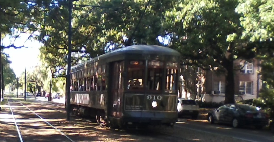 streetcar under oak trees on St. Charles Avenue in New Orleans